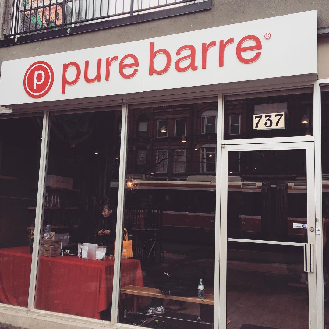 An image of the exterior of the Pure Barre Toronto location on Queen Street West in Toronto.
