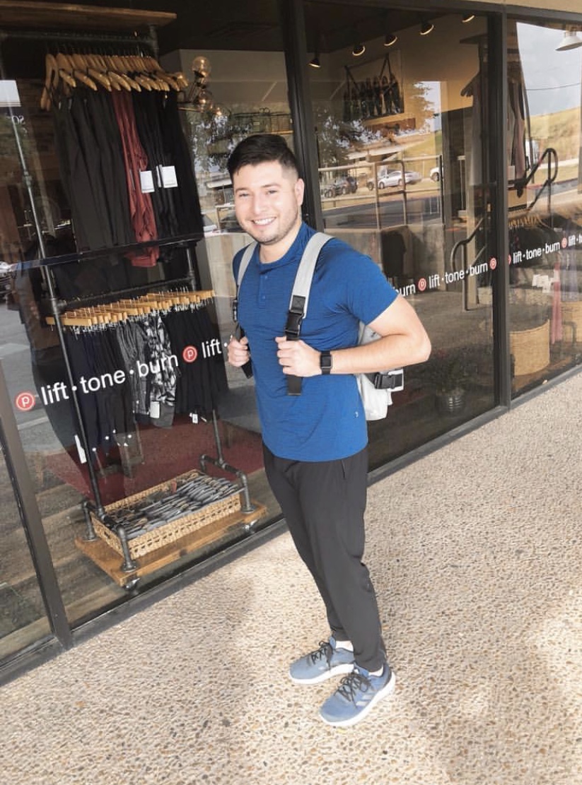 An instructor outside a Pure Barre studio