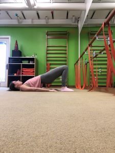 Women doing the back dancing position at the barre