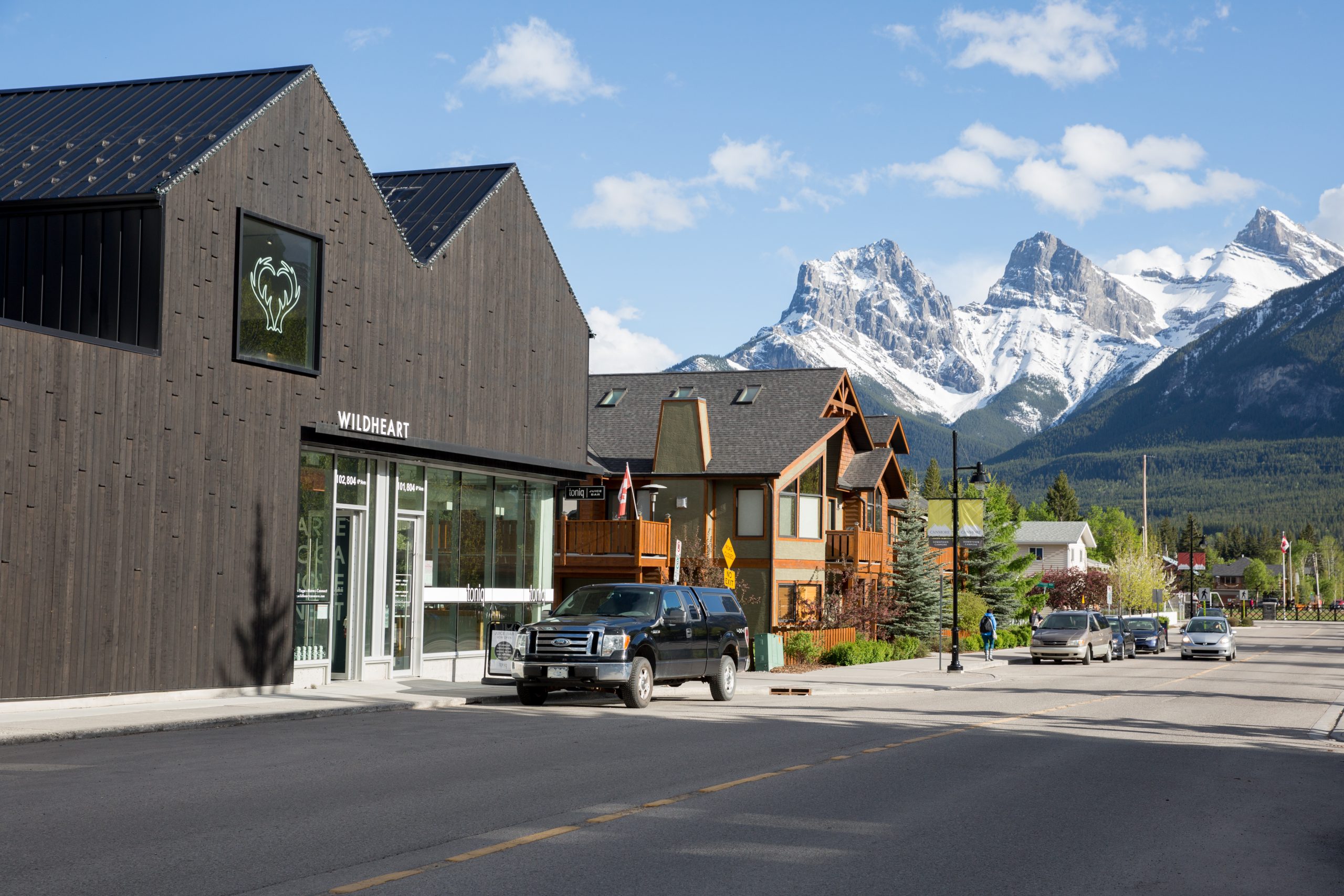 The exterior of WildHeart Canmore, a yoga and barre studio in the Rocky Mountains of Canada.
