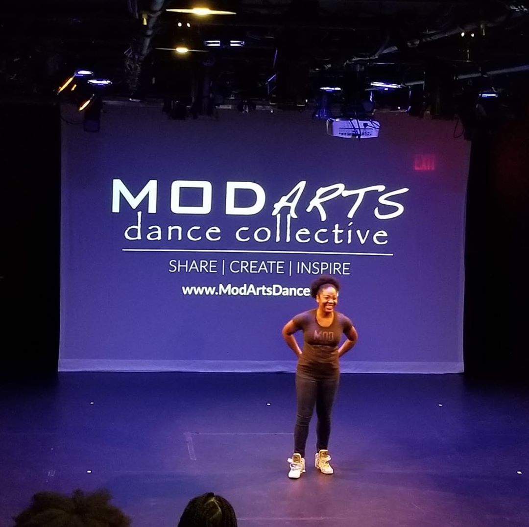 Leah Tubbs of MOD Arts Dance Collective on stage