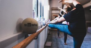 The Bar Method ball on the barre