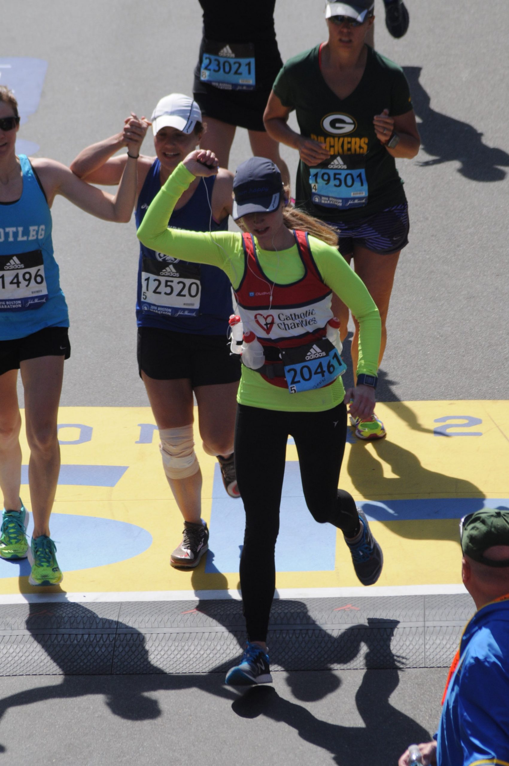 Jennifer Mathieu Henshall at the finish line of the Boston Marathon.