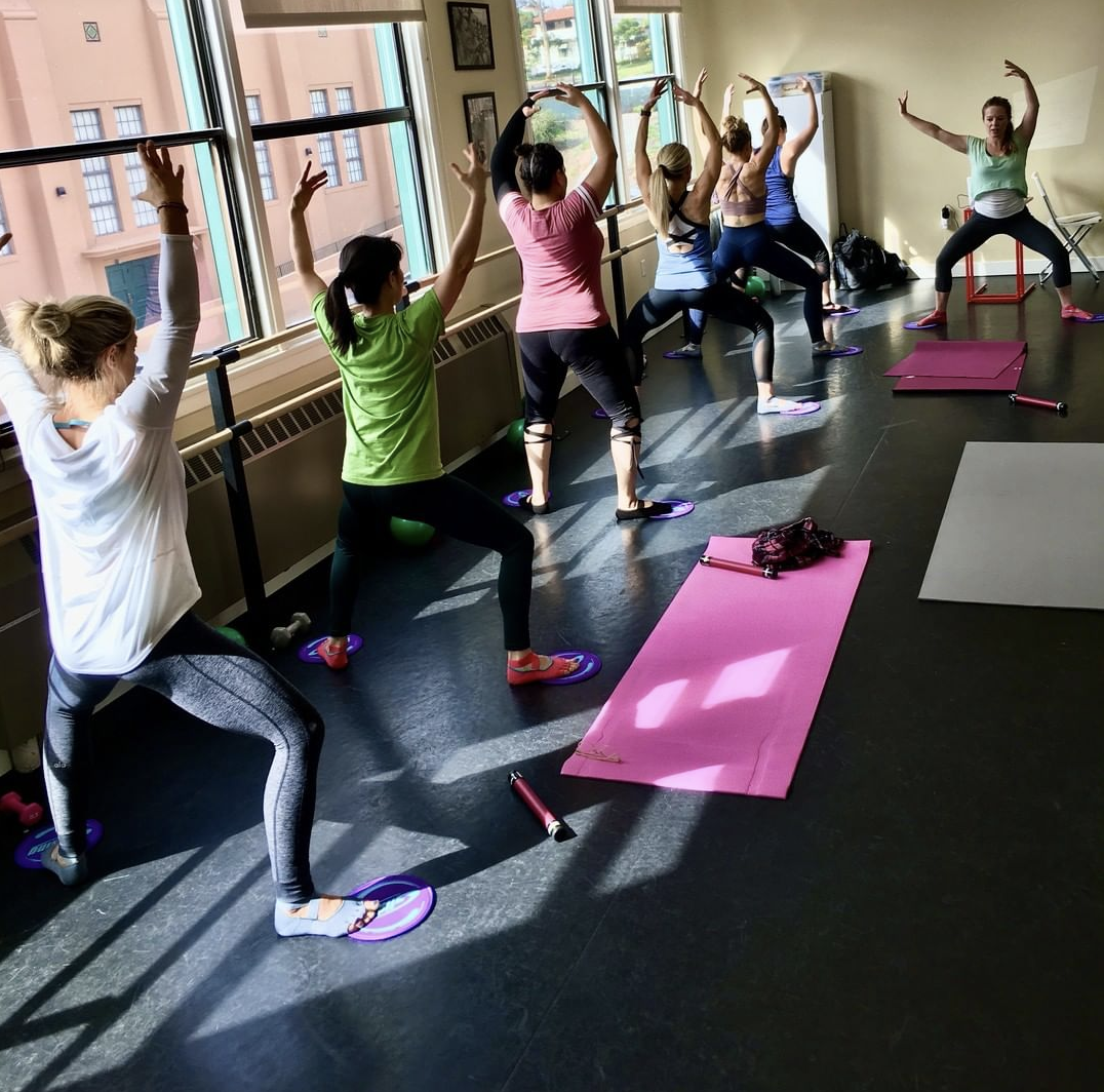 Students taking a Barre Above class.