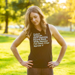 A woman models the List of Barre Exercises Scoop Muscle Tank Top in Black